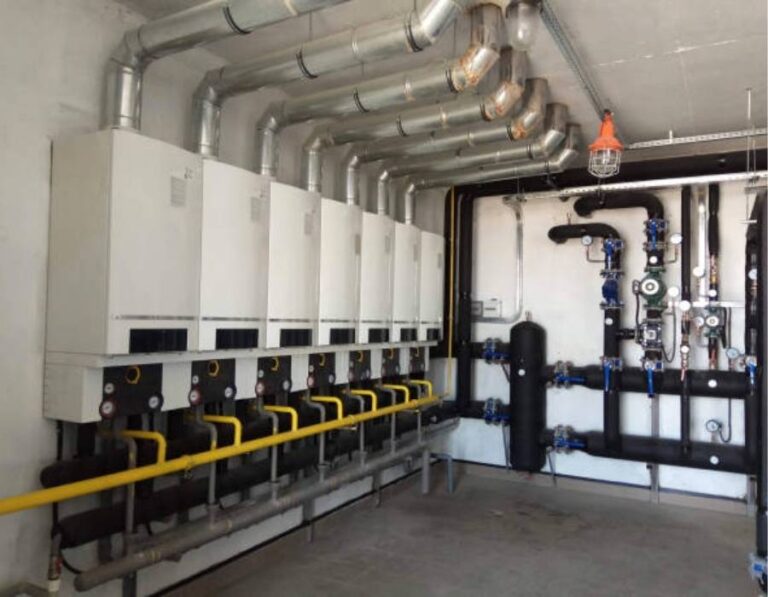 Commercial plumbing system with multiple boilers and industrial piping installed in Utah facility
